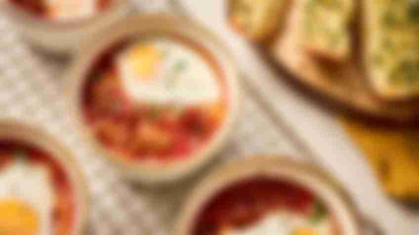 Baked Eggs with Toscano Ground Sausage and Garlic Toasts