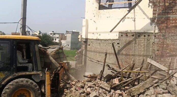 BOLDOZER ACTION AGAINST DRUG PEDDLER PROPERTY AT ASR.25.3.25.1