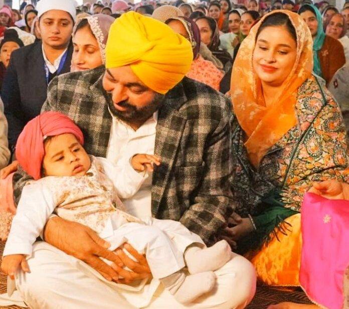C.M MANN WITH WIFE FILE PHOTO