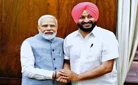 PM-MODI-WITH-BITTU-SNE-IMAGE