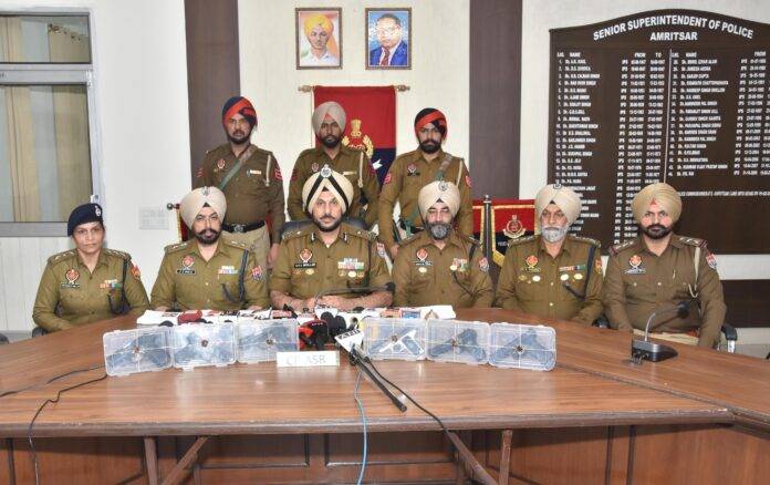 POLICE-COMMISSSIONER-WITH-TEAM