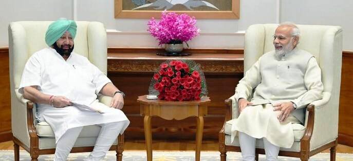 CAPT.AMRINDER SINGH WITH PM MODI BY SNE NEWS IMAGE (FILE PHOTO)
