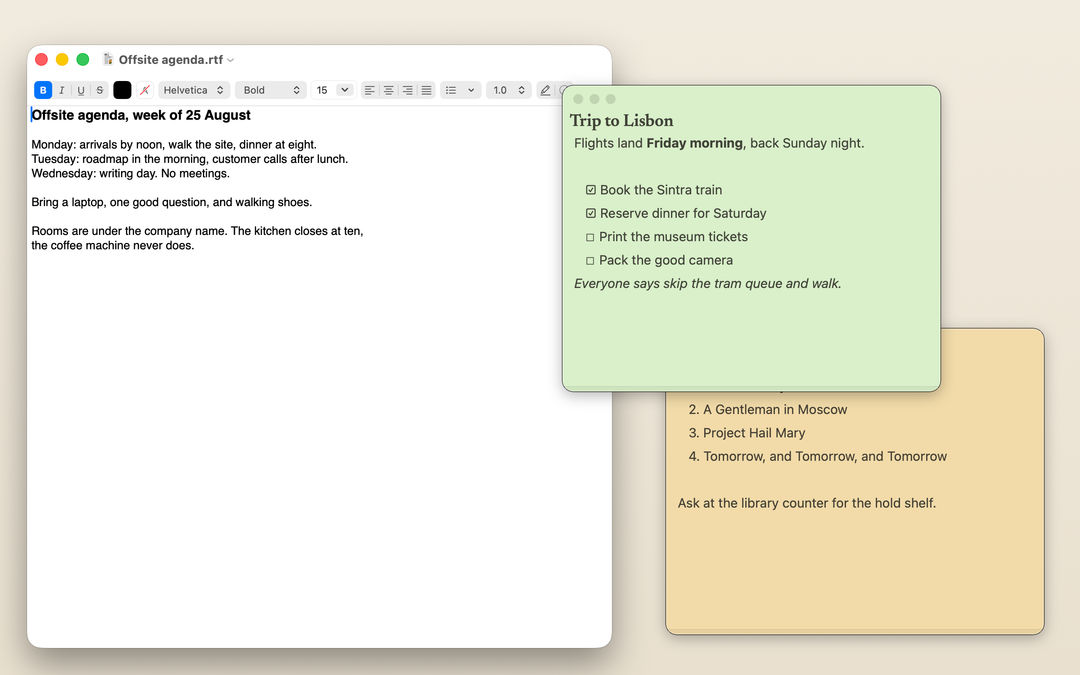 A desk with a document and two floating notes, as its owner sees it