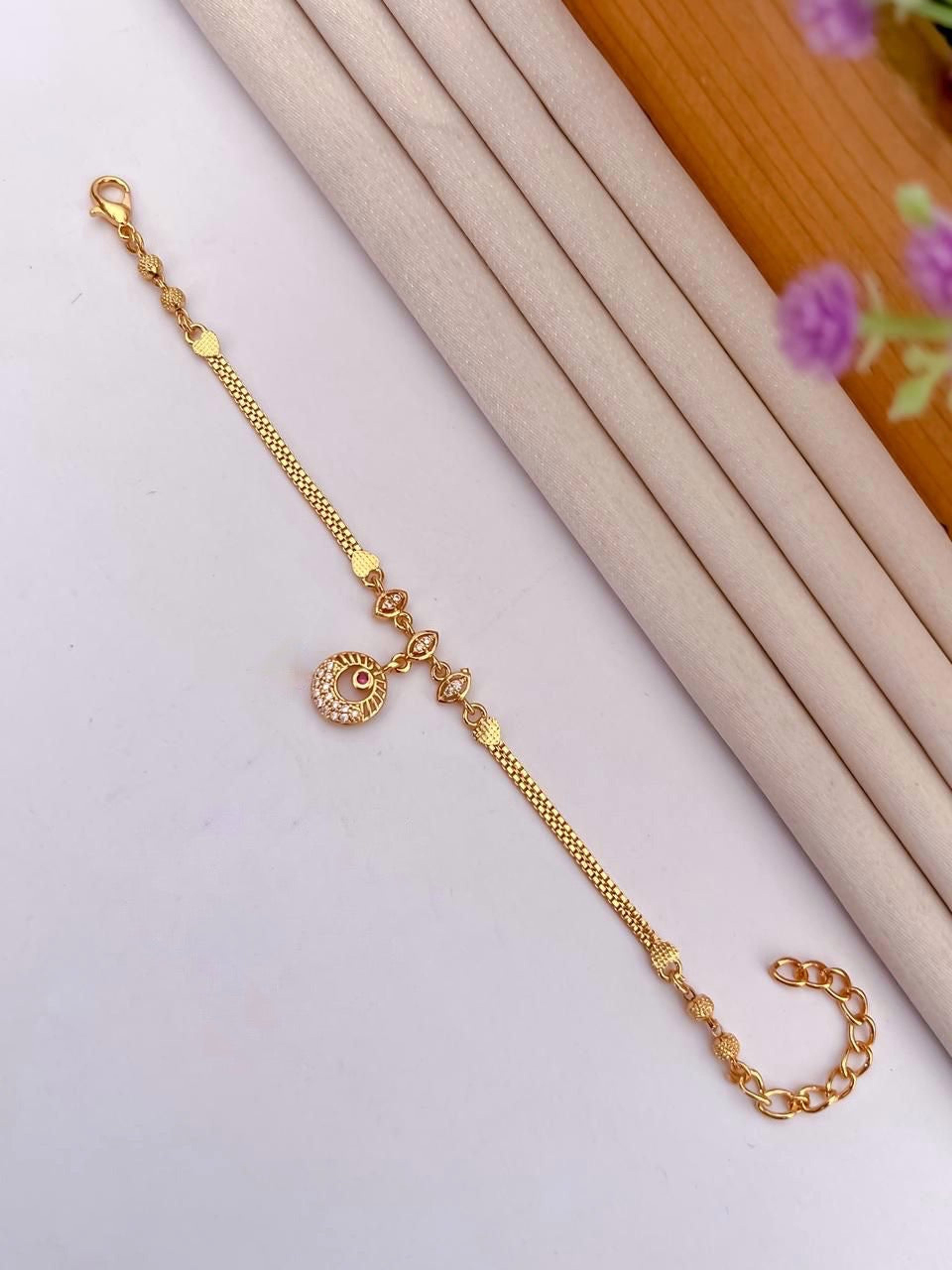 AD Stone Circular Charm Gold-Tone Bracelet