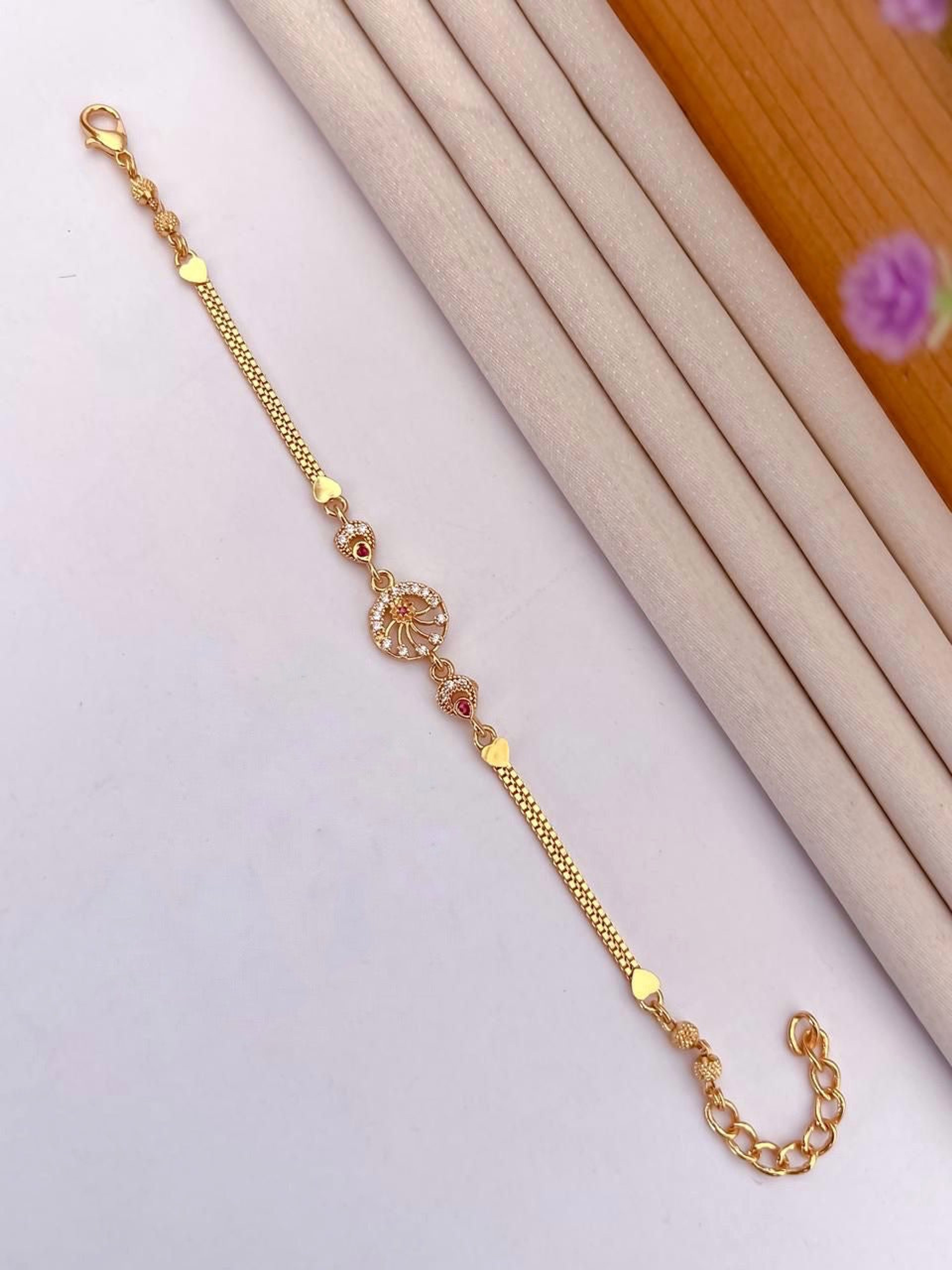 Gold-Tone AD Stone Circular Motif Bracelet