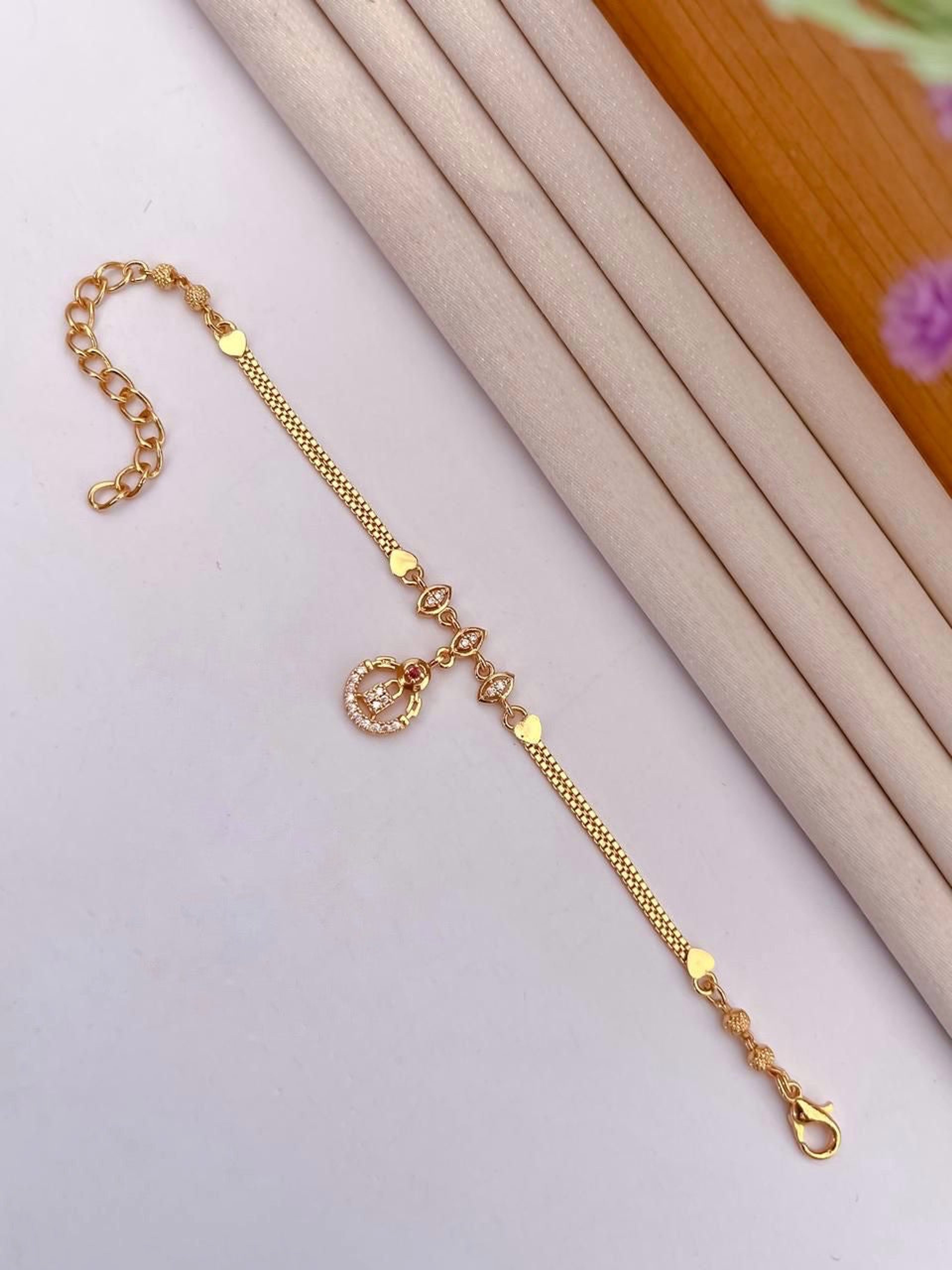 Gold-Tone Circular Charm AD Stone Bracelet