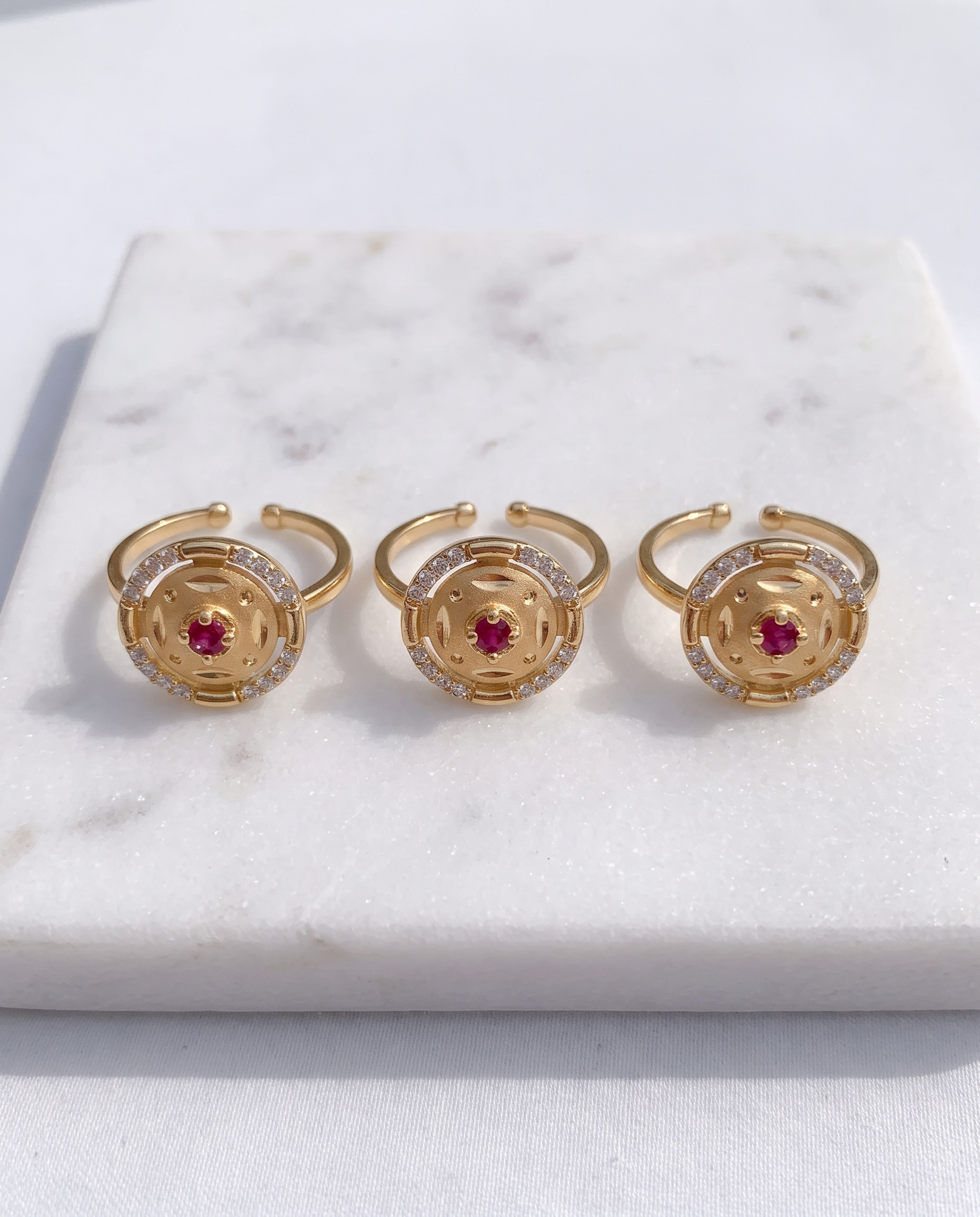 AD Diamond Golden Ring 03 laid on white marble