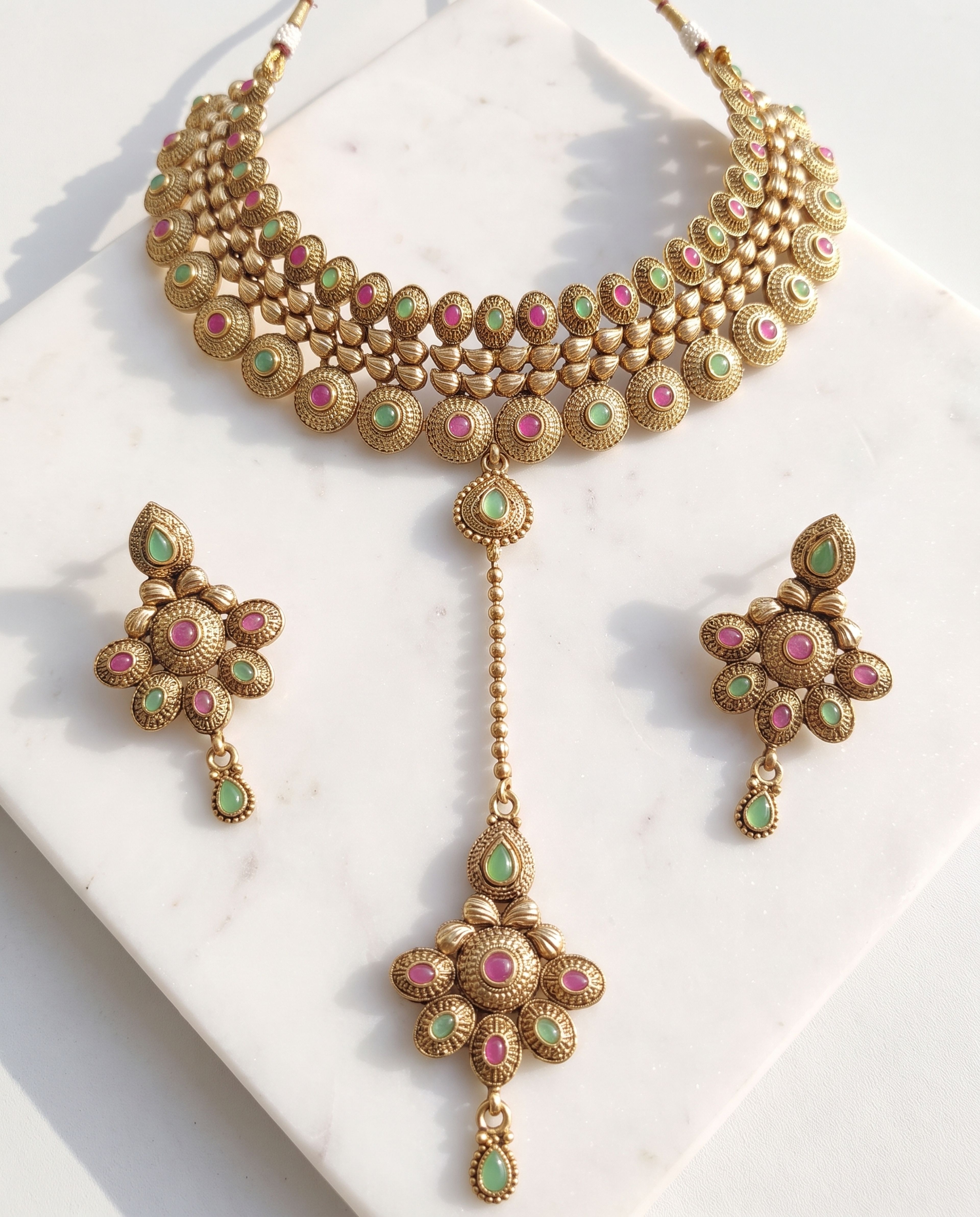 Antique Choker Set laid on white marble