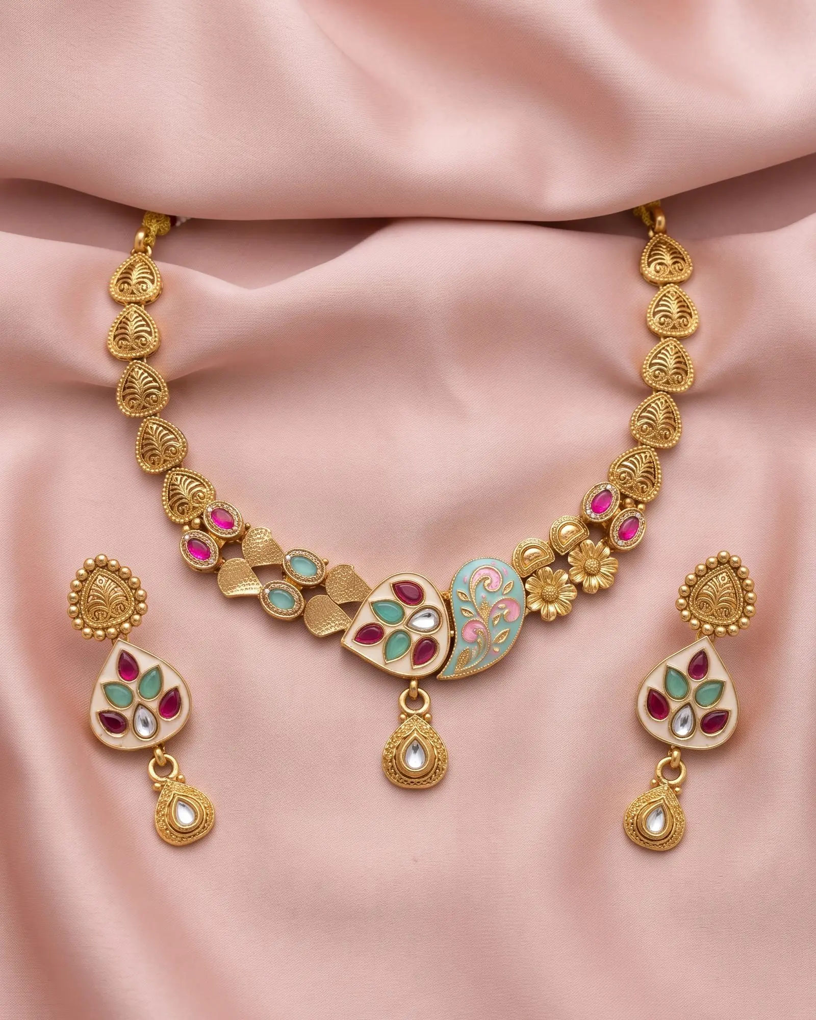 Antique Paisley Enamel Choker Set laid on white marble