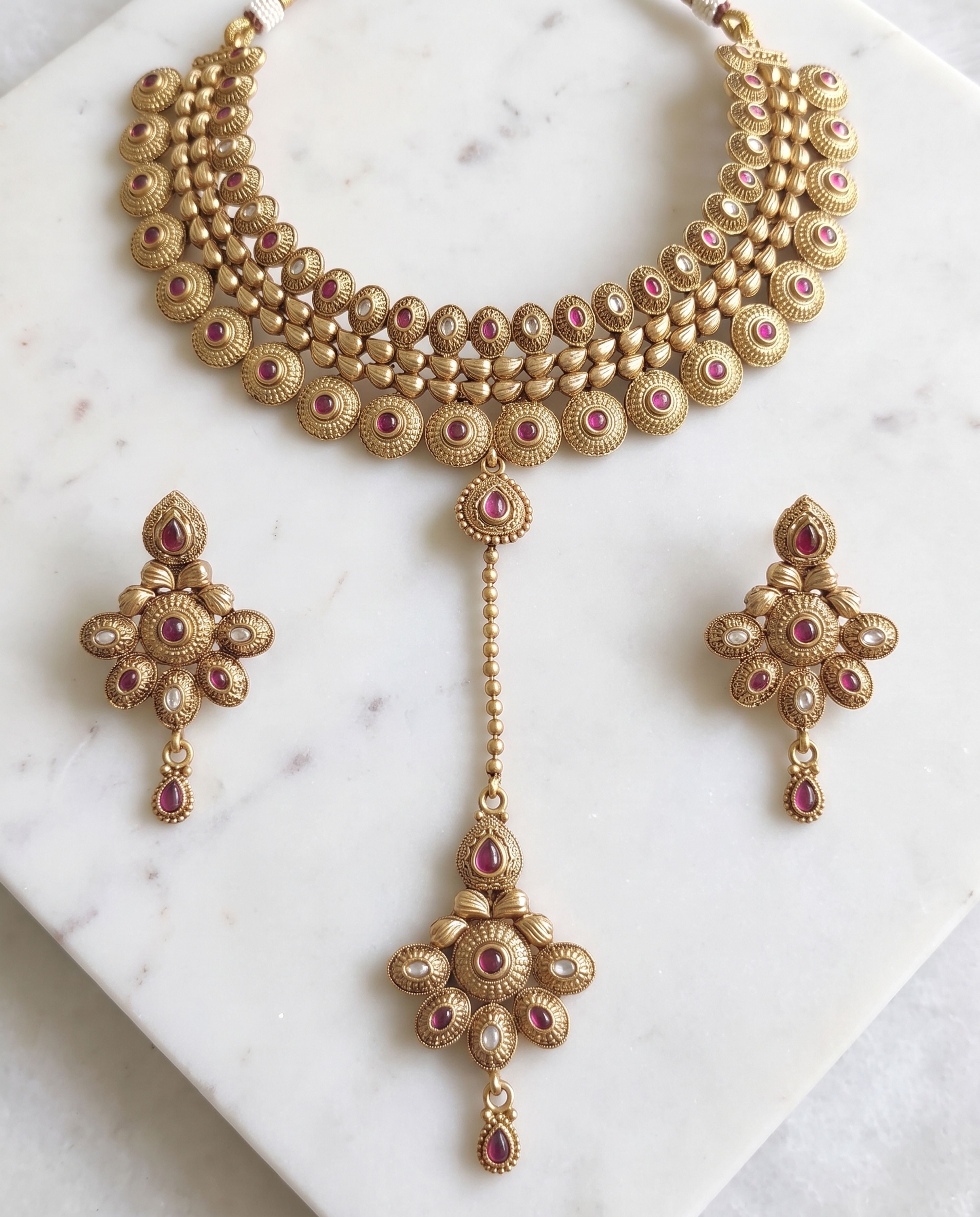 Antique Choker set laid on white marble