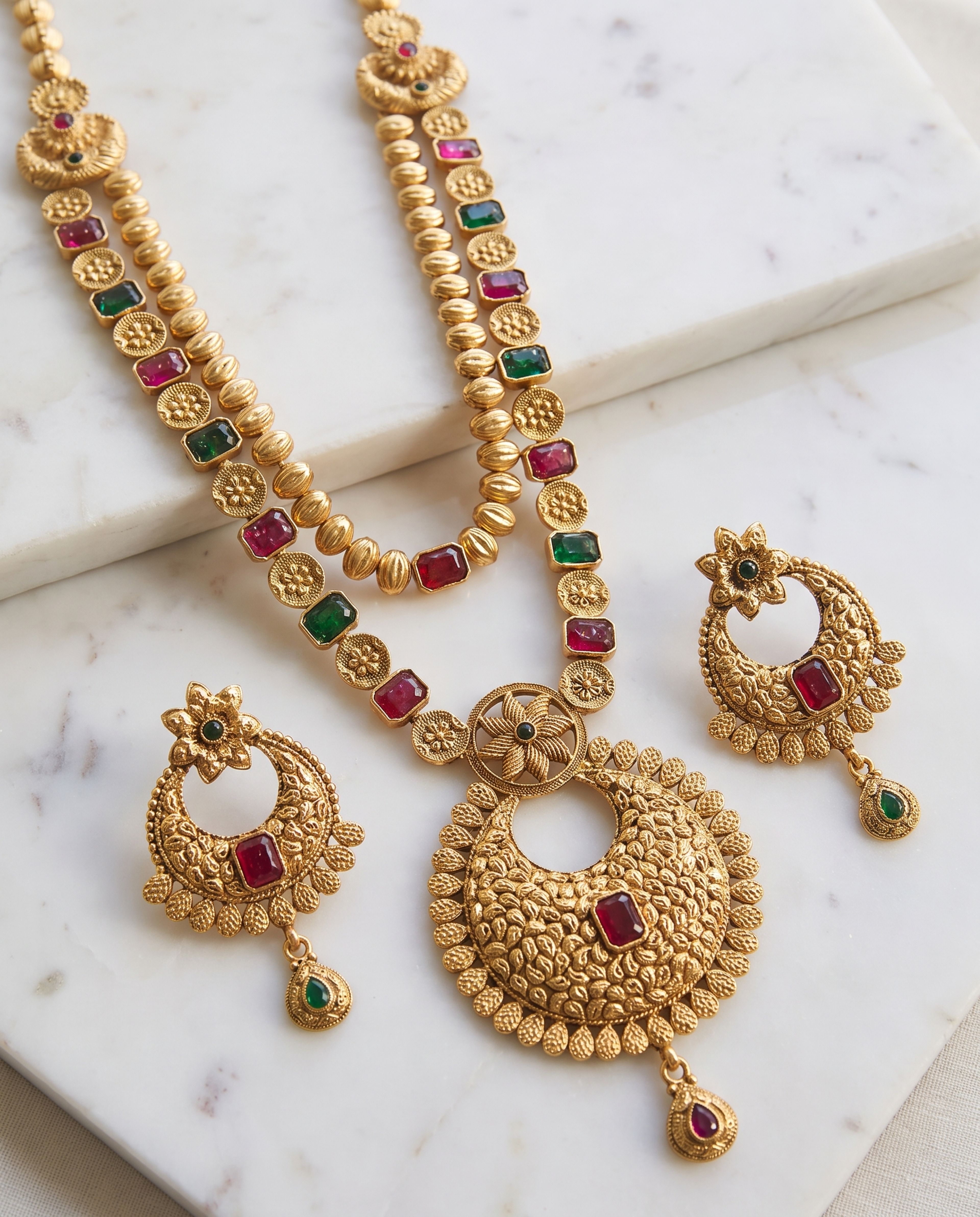 Antique Layer Chain with Earrings laid on white marble