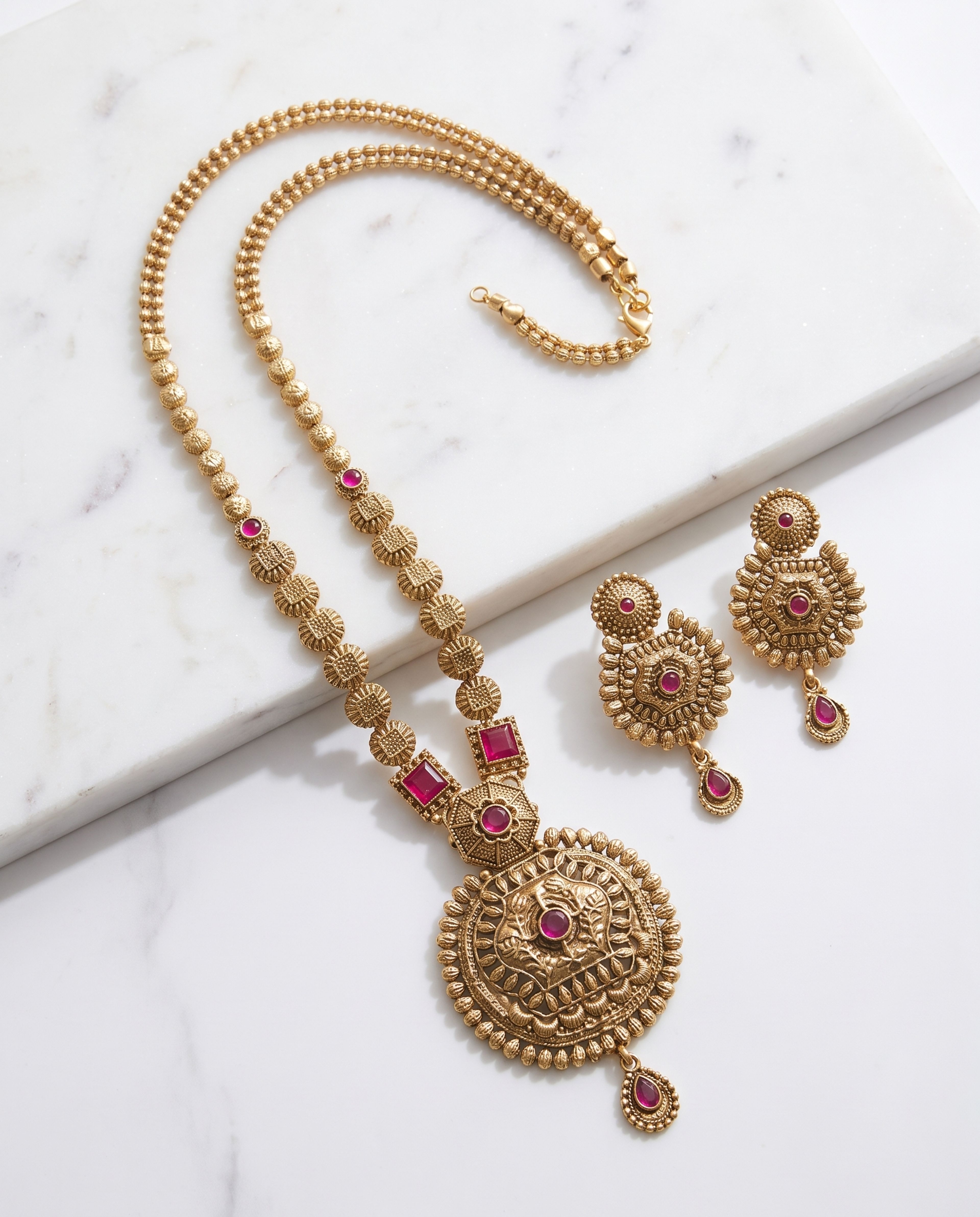 Antique Long Chain with Earring laid on white marble