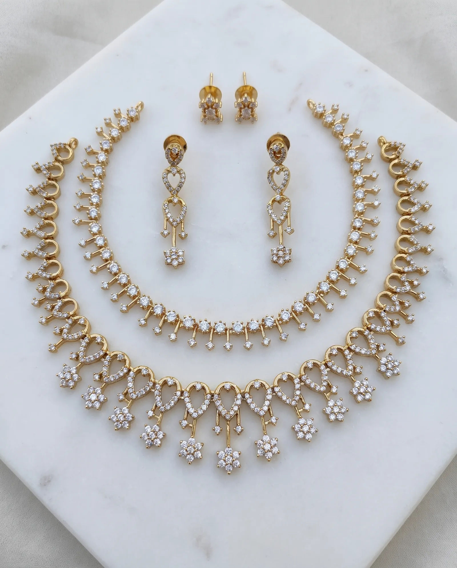 Choker Set combo laid on white marble