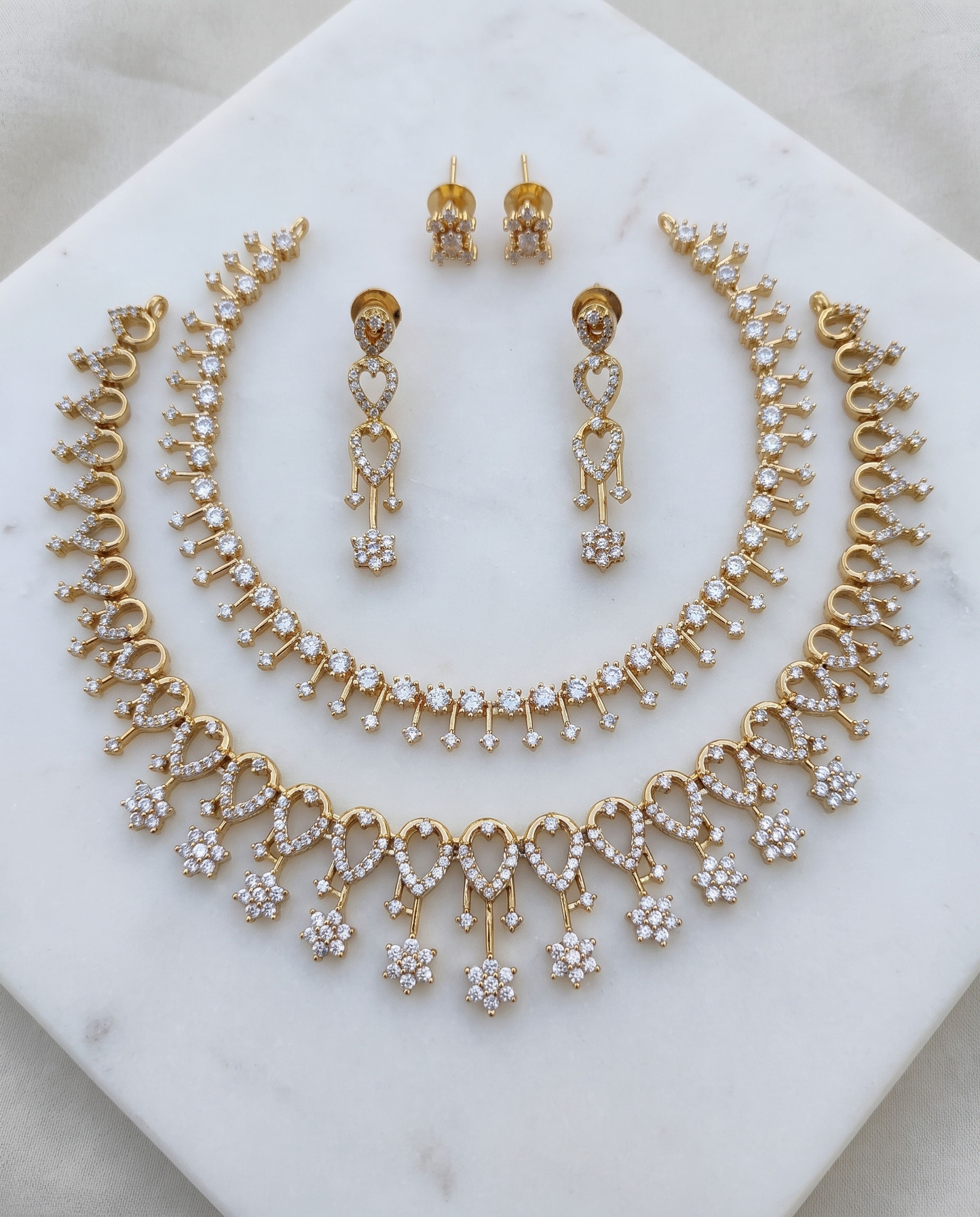 Choker Set combo laid on white marble