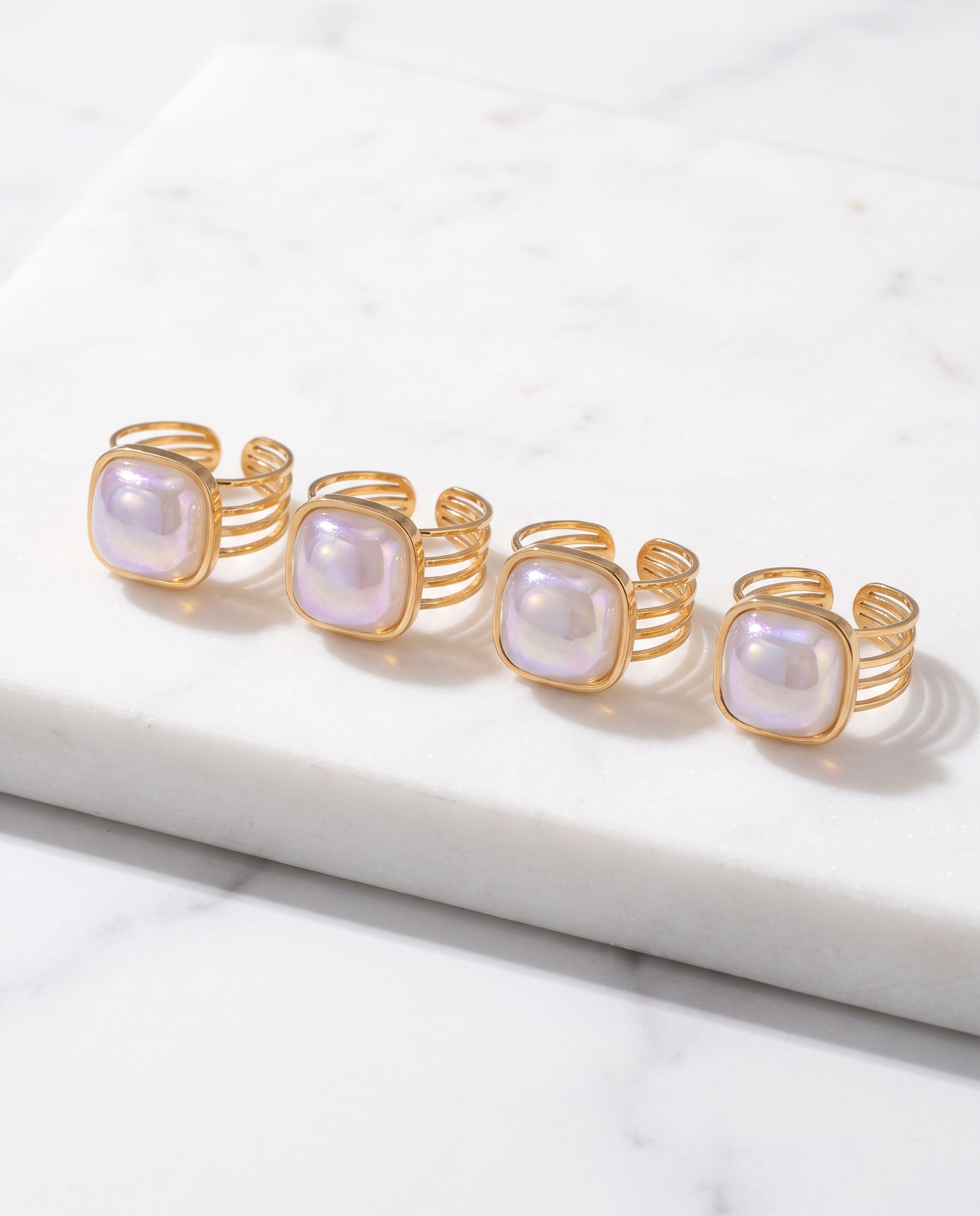 The Lumina Anti Tarnish Ring laid on white marble