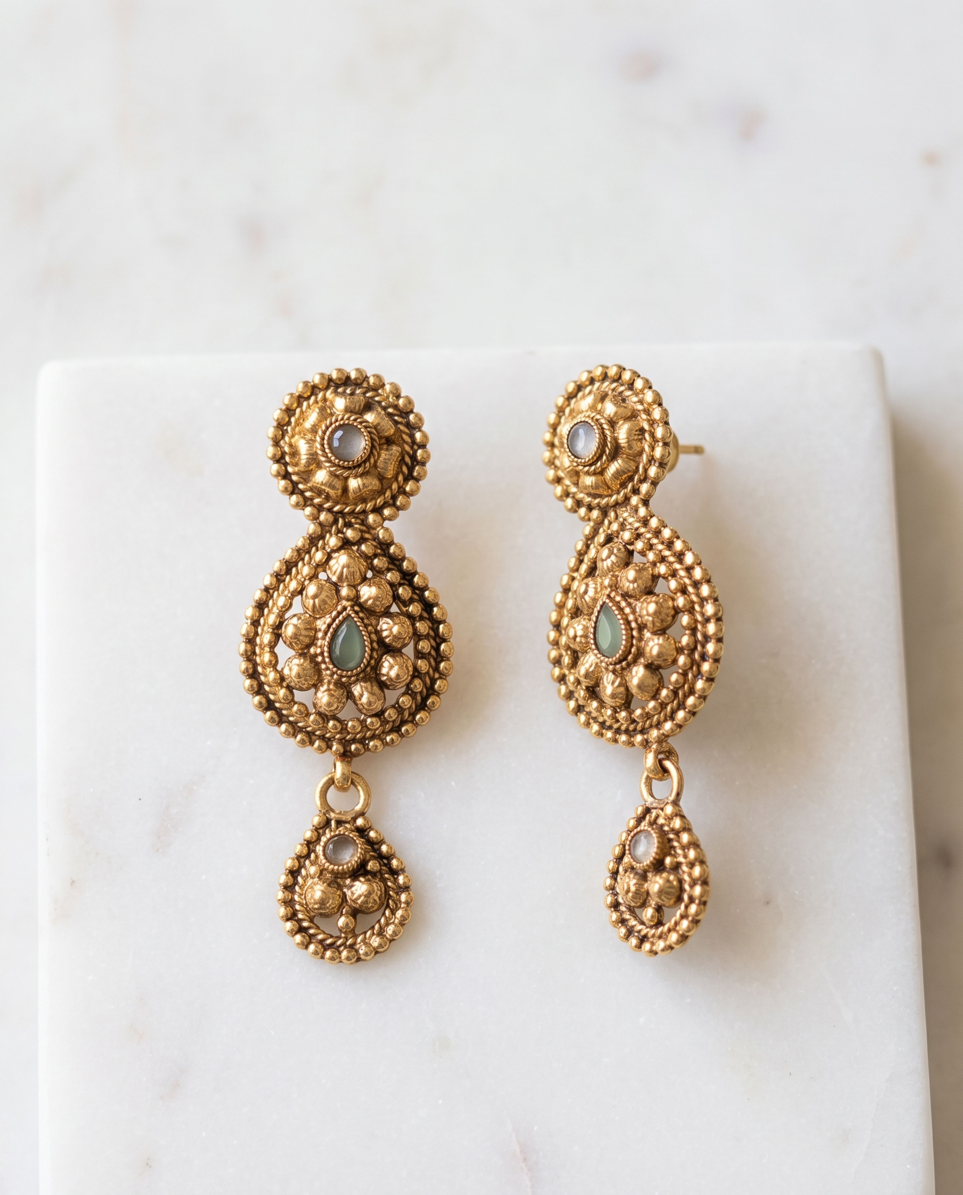 Earring Antique laid on white marble