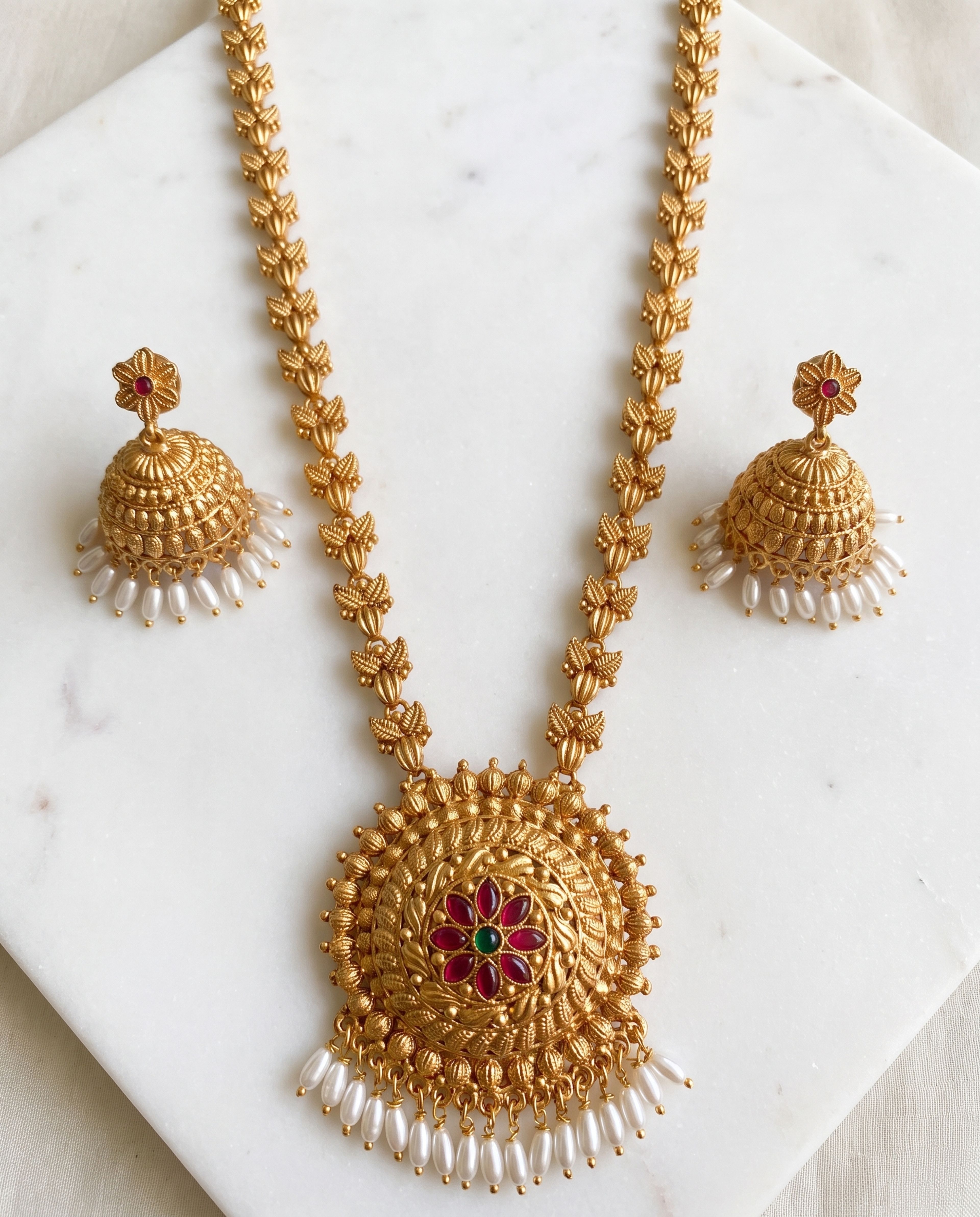 Jhumka Haram Set laid on white marble