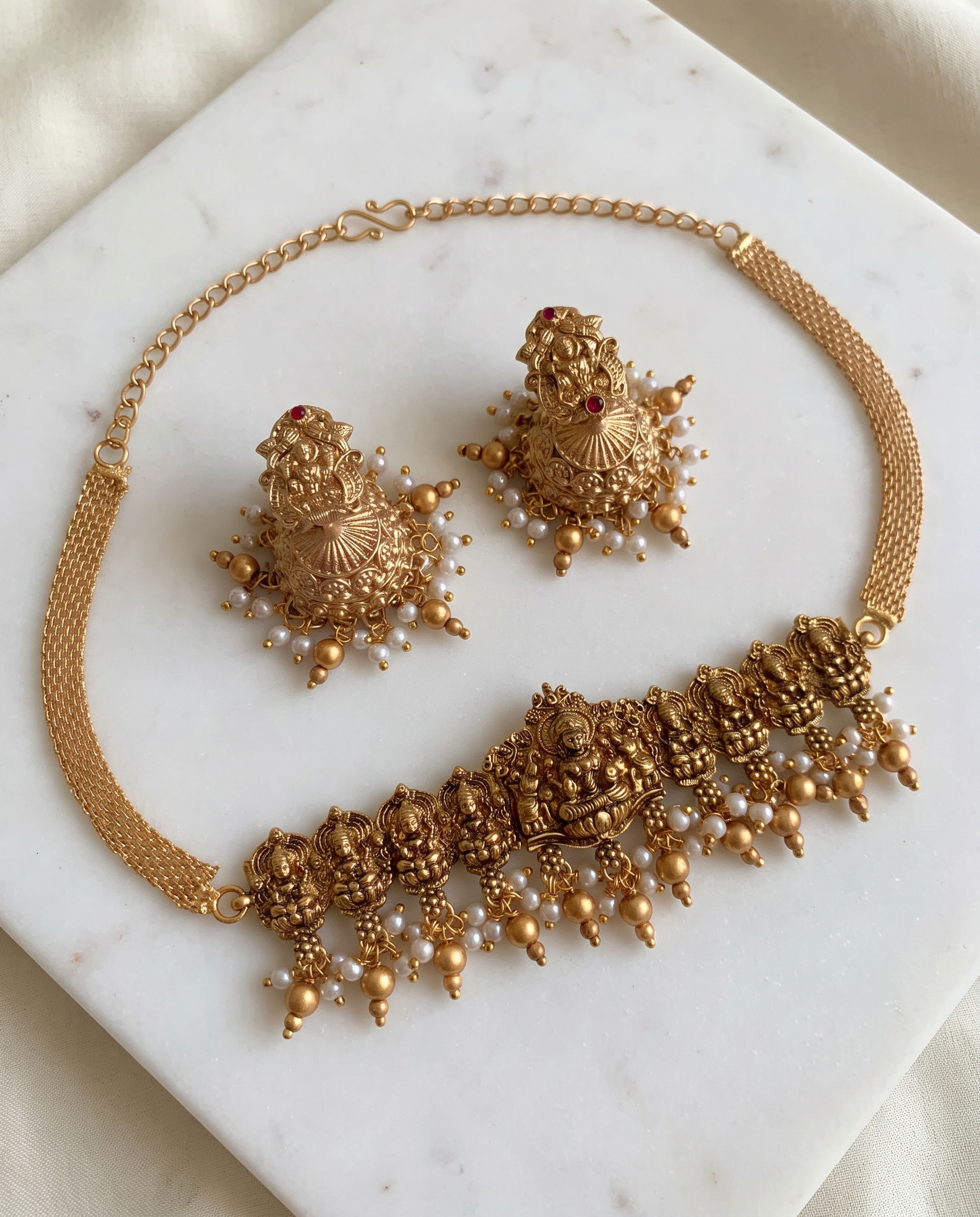 Lakshmi Choker Set laid on white marble