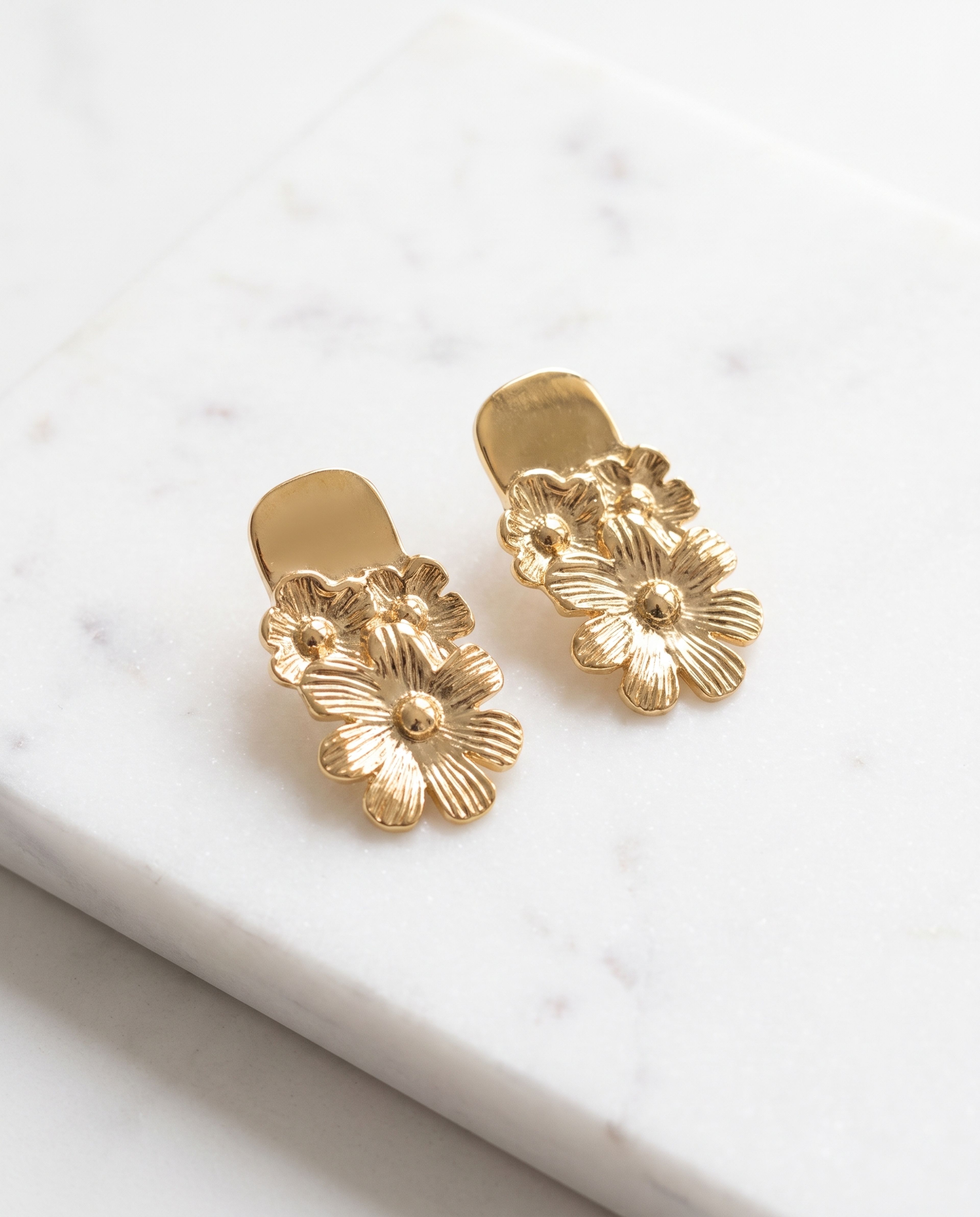 Petal Drop Earring Anti Tarnish laid on white marble