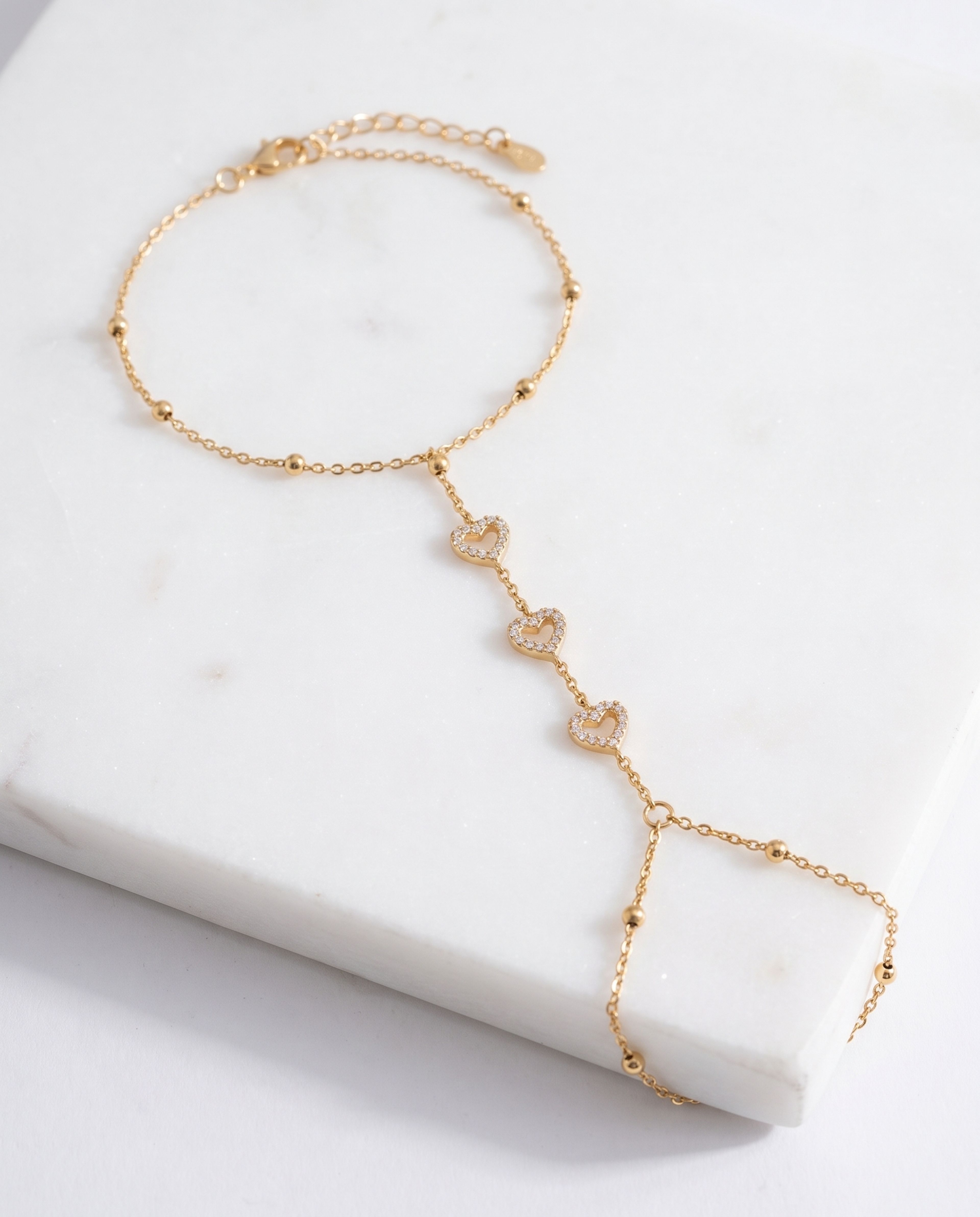 Ring Bracelet Anti Tarnish laid on white marble