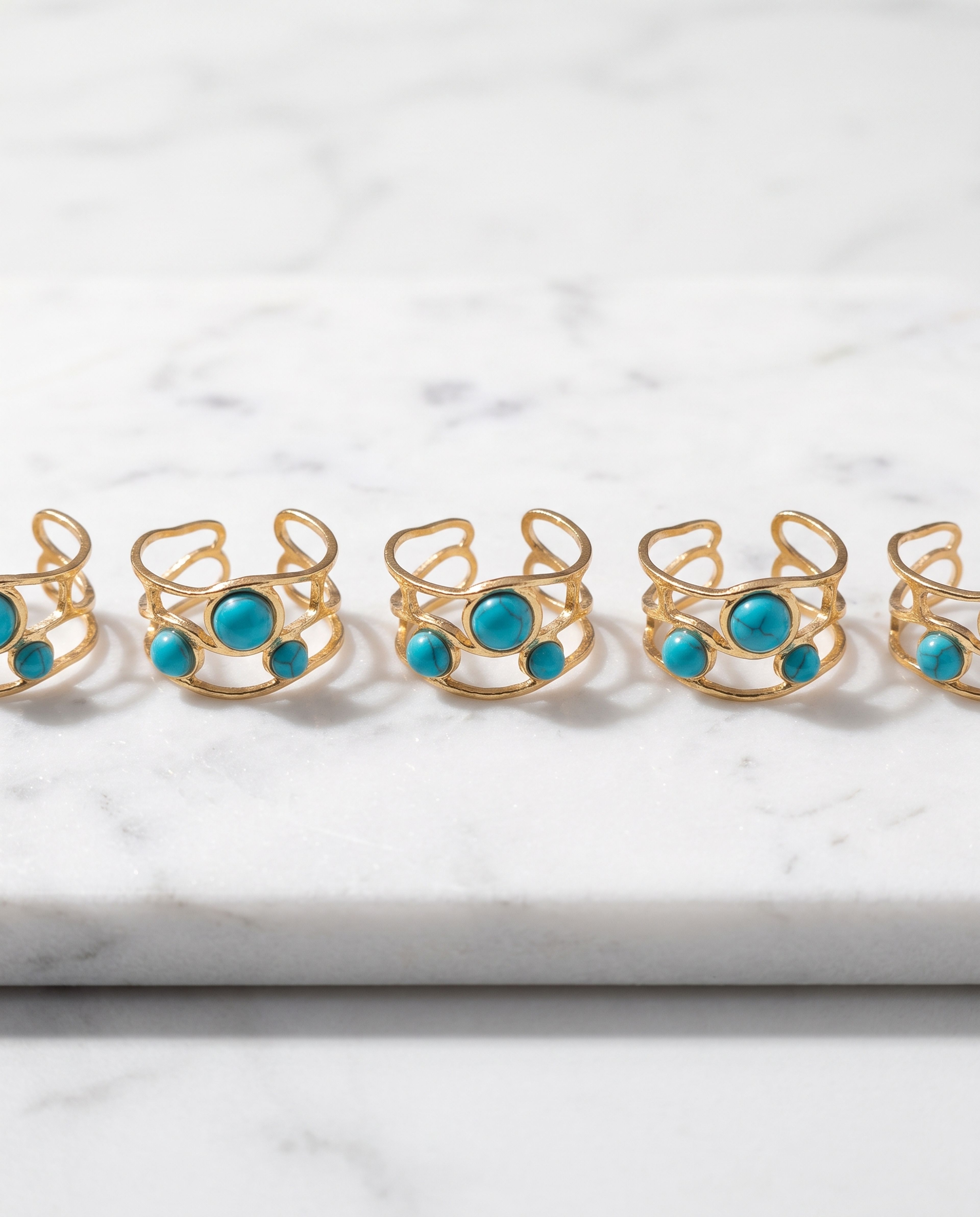 Turquoise Glow Anti Tarnish Ring laid on white marble