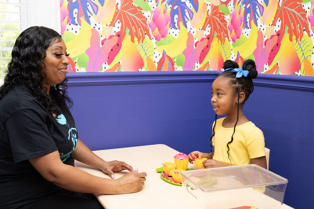 Child with speech therapy number board