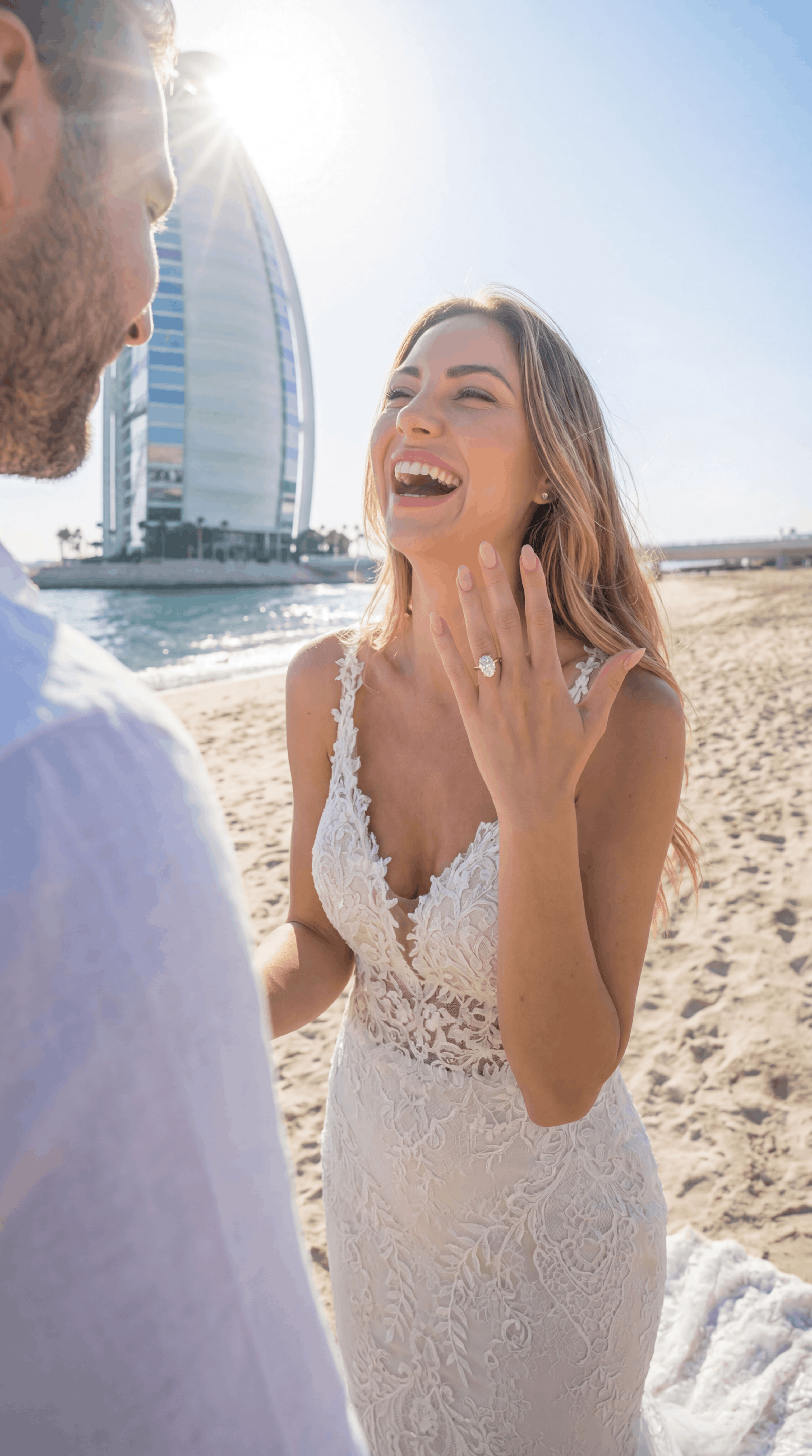Photorealistic AI generated image of a woman wearing a diamond engagement ring on a beach, highlighting the brilliance of the diamond, AI jewelry photography style.