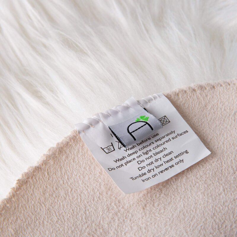 Kayzlynn Handmade Shag Faux Sheepskin White Area Rug-5'x8' thumbnail 3