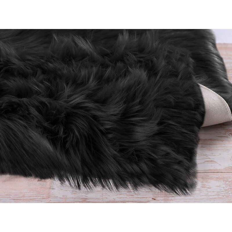 Kemmi Faux Sheepskin Black Area Rug thumbnail 2