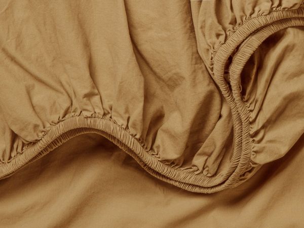 brushed-cotton-fitted-sheet_ochre_detail_22631 designed by Lindsey Gregory