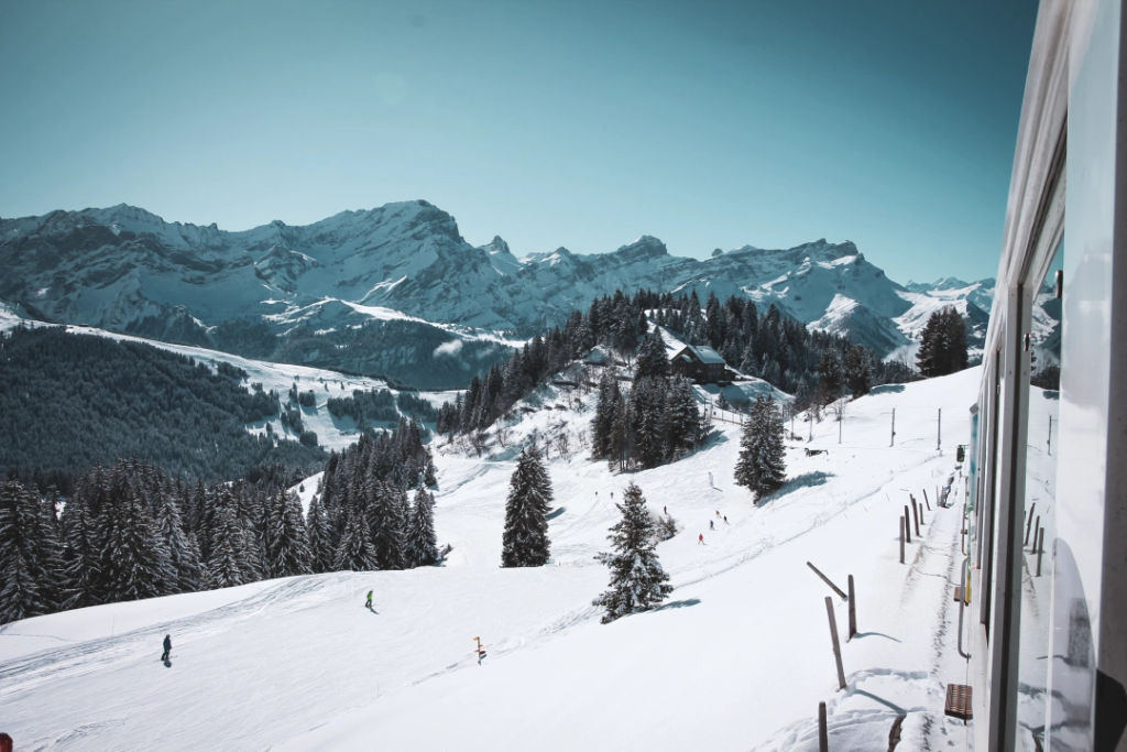 CTA Ski the Tpc Train and Skiers on the Piste Populaire in Villars