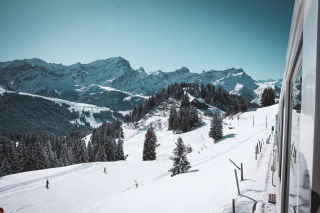 CTA Ski the Tpc Train and Skiers on the Piste Populaire in Villars