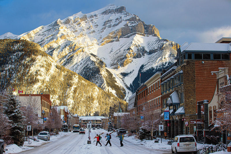 Family bonding on the slopes at SkiBig3 in Banff National Park