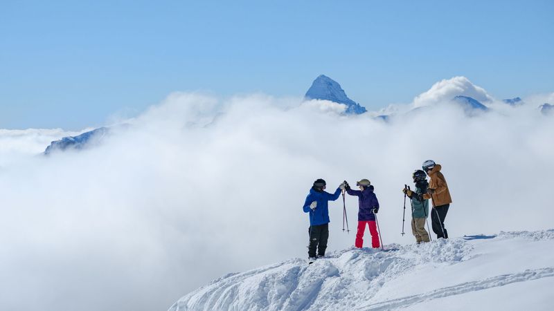 Group of Skiers enjoying a sunny day at Banff Sunshine