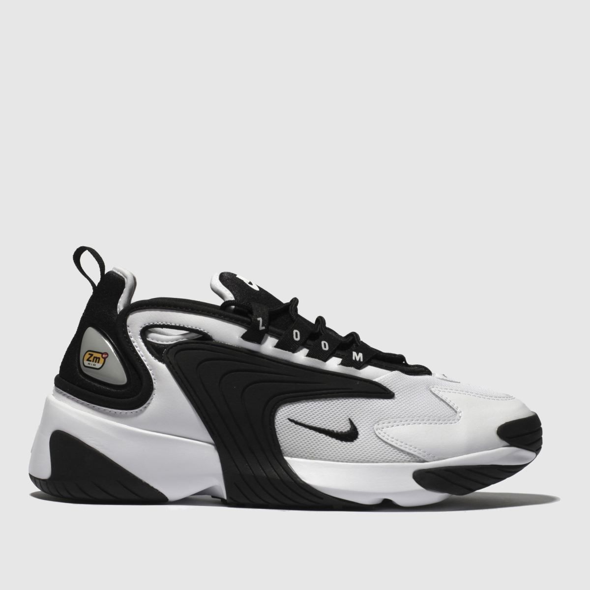 white & black zoom 2k trainers