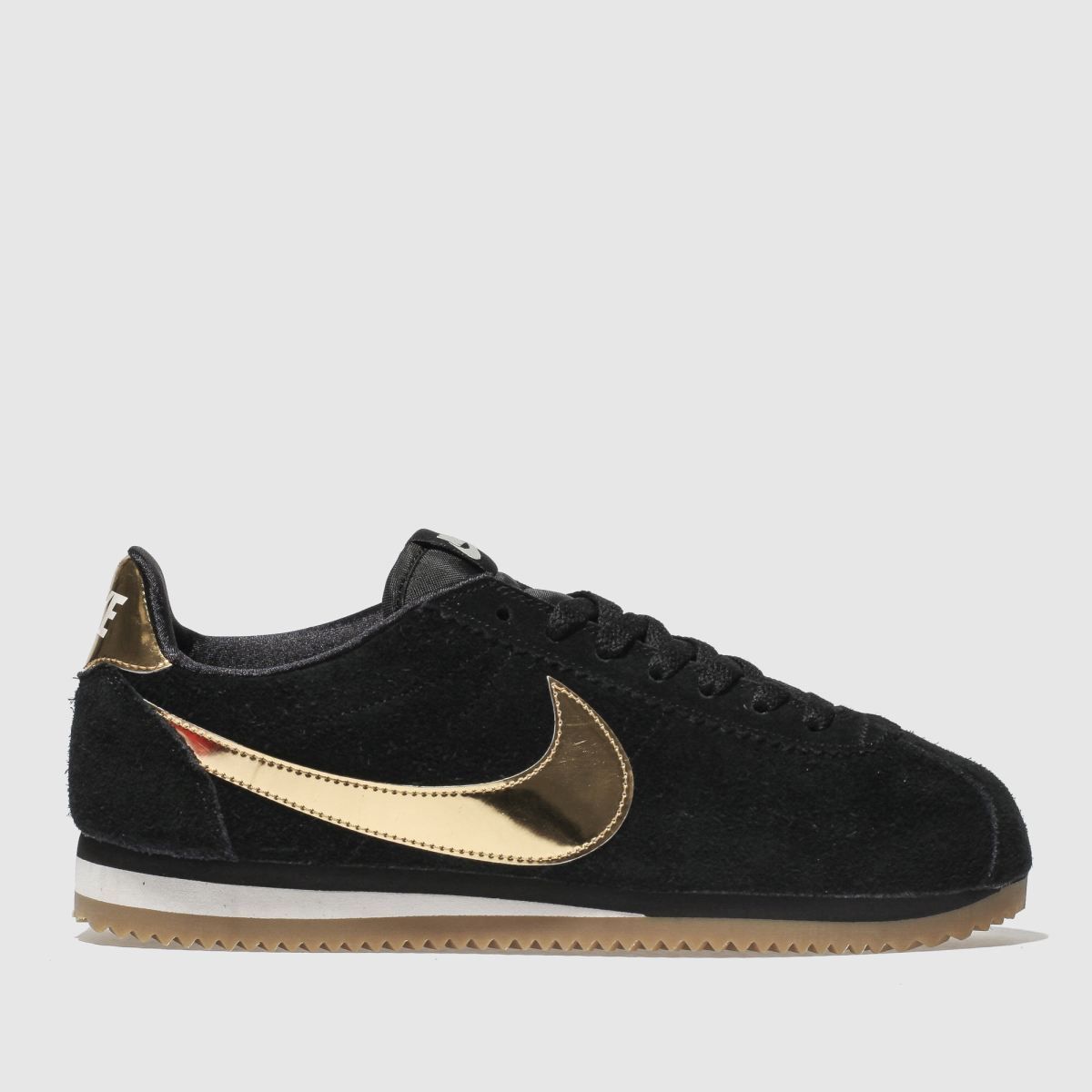 nike black and gold trainers