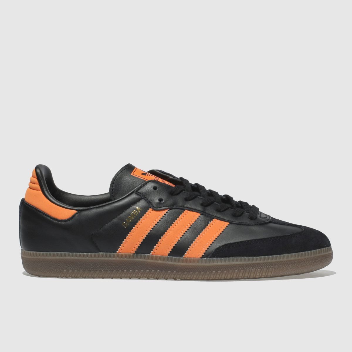 black and orange adidas trainers