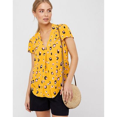 yellow animal print blouse