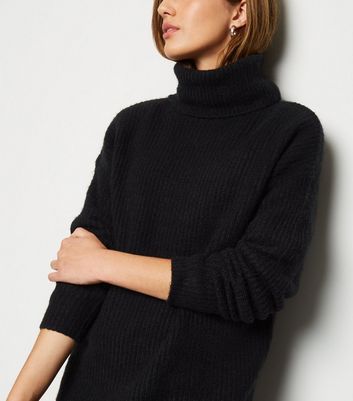 slouchy roll neck jumper