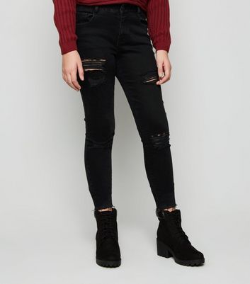 girls black ripped skinny jeans