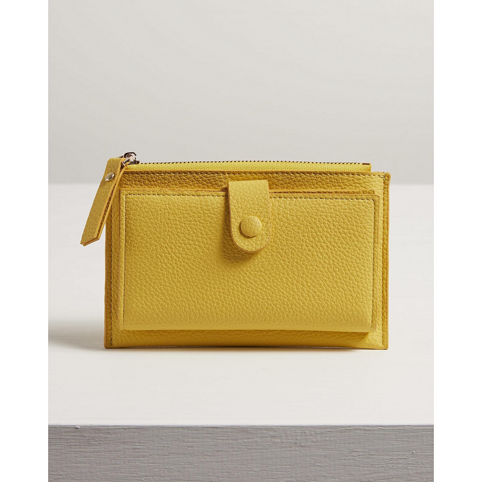 oliver bonas yellow purse