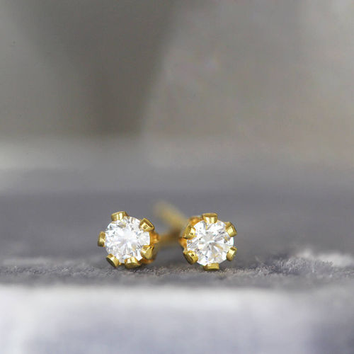 Tiny White Diamond Stud...