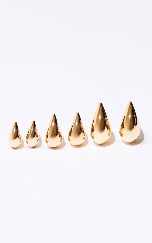 Gold Tear Drop Stud Earring...