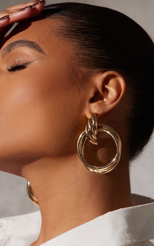 Gold Twist Hoop Statement...