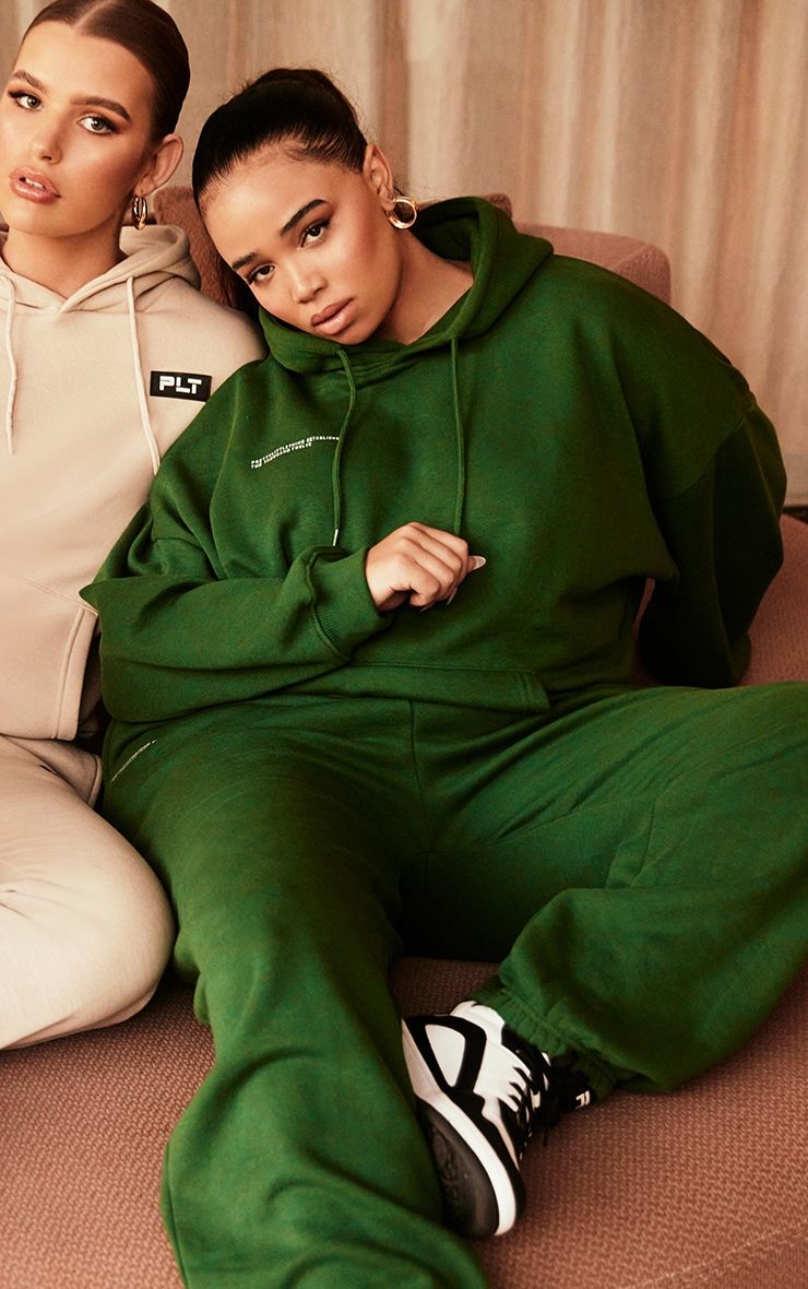 PRETTYLITTLETHING Plus Forest Green Sand Est 2012 Joggers Forest