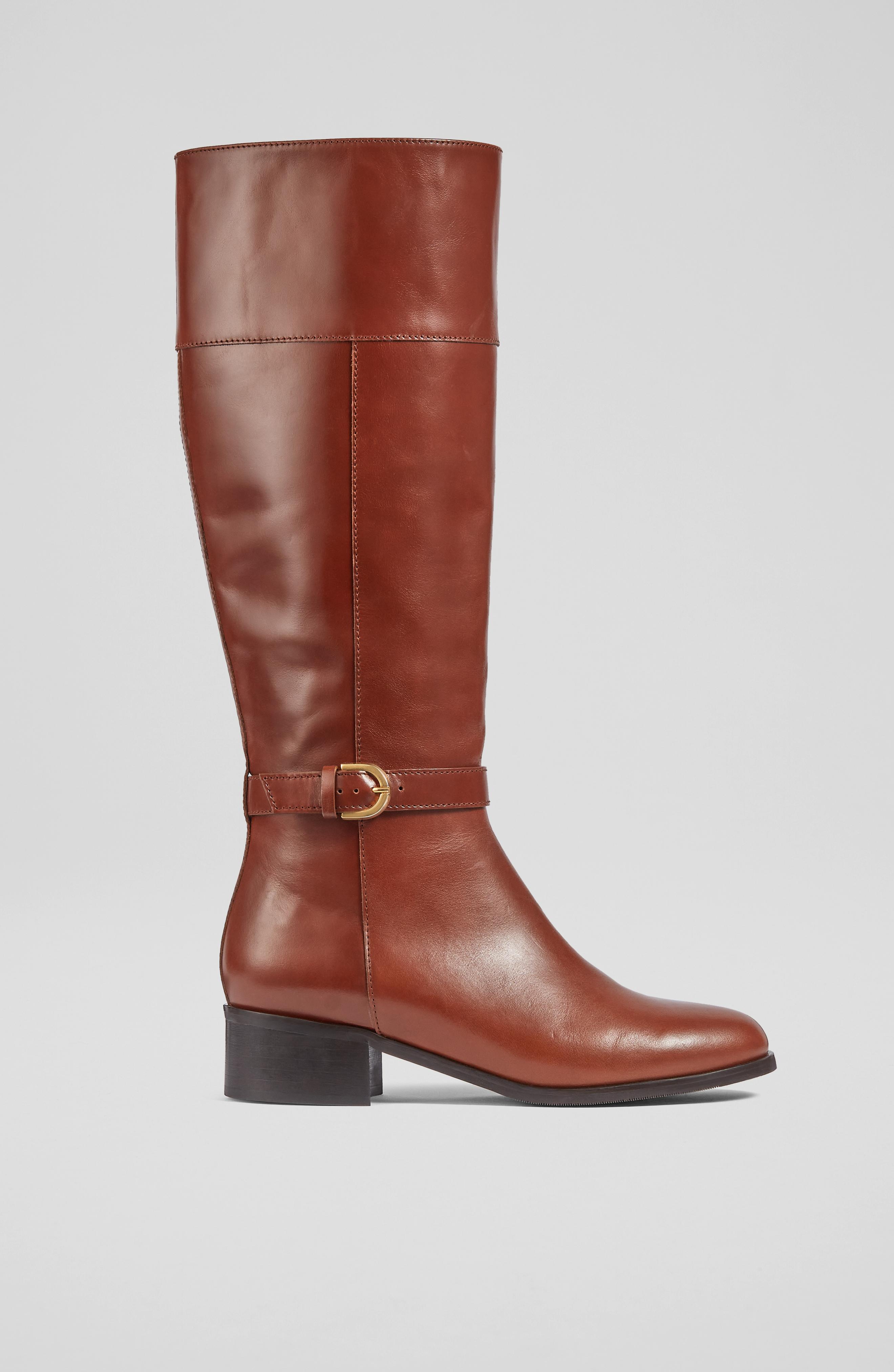 Flat tan knee high boots hotsell