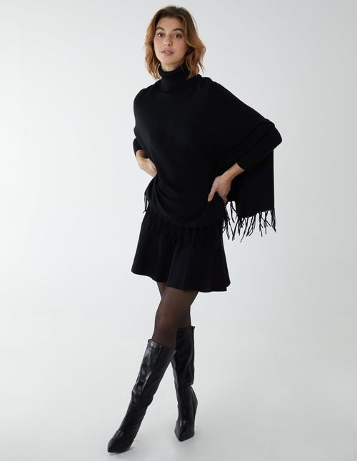 Tassle Hem Roll Neck Poncho -...