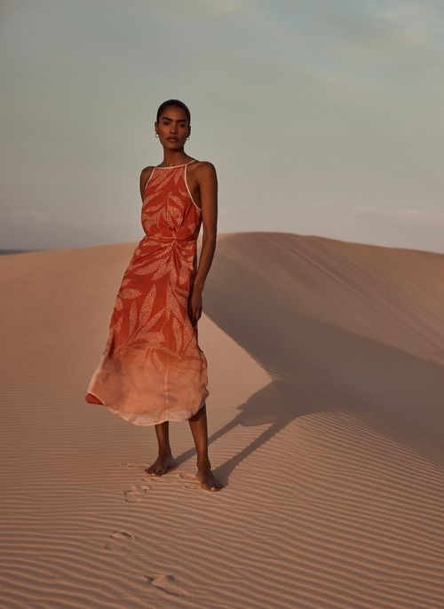 Orange Printed Halter Maxi...