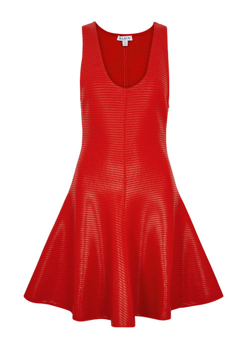 Alaïa Coated Ribbed-knit Mini...