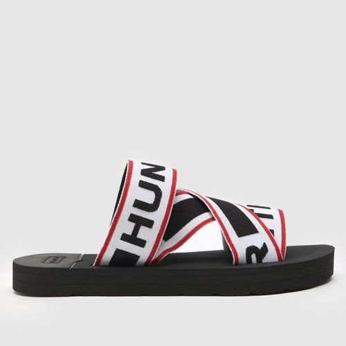 schuh taye slider sandals in black